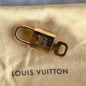 Louis Vuitton Shiny Gold Lock and Key